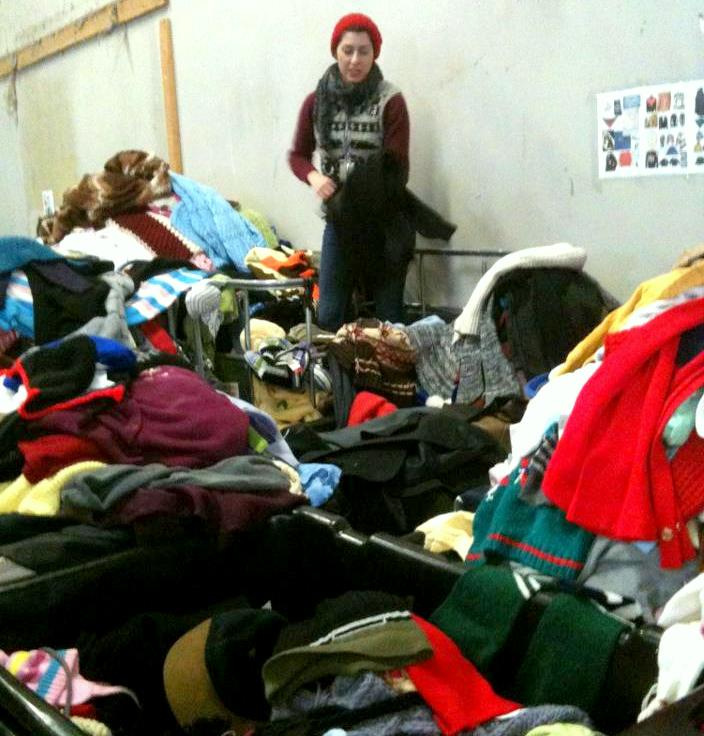 Melissa, knee-deep in reclaimed sweaters.